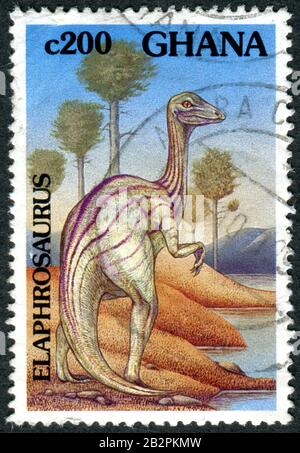 Ghana - CIRCA 1992: Un francobollo stampato in Ghana, raffigura i Dinosaurs - Elaphrosaurus, circa 1992 Foto Stock
