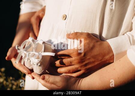 Sweet Moments Of Anticipation. Charming Expectant Mother Relax In