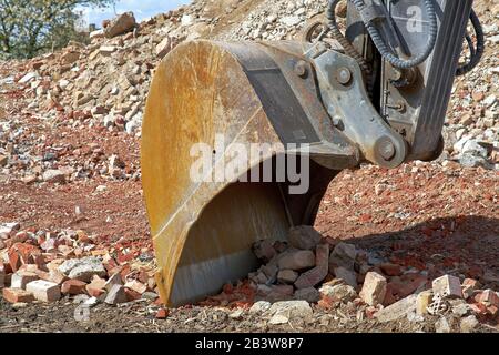 Primo piano di una benna per escavatore idraulico Foto Stock
