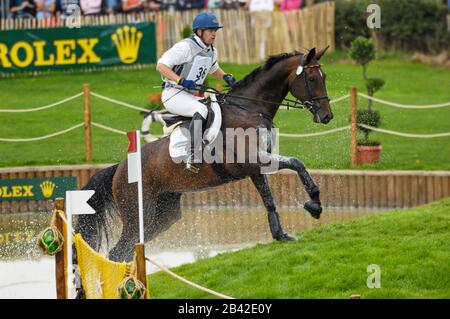 Andreas Dibowski (GER) riding FRH servire bene - Giochi equestri mondiali, Aachen, - Agosto 26, 2006, Eventing Cross Country Foto Stock