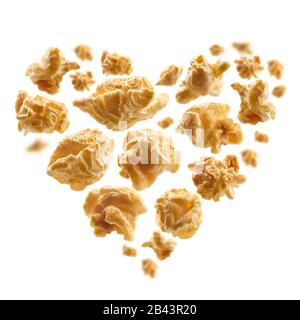 Popcorn con un gusto di caramello a forma di cuore Foto Stock