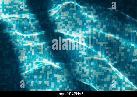 Piscina d'acqua senza cuciture caustiche texture. Abbagliamento sull'acqua Foto Stock