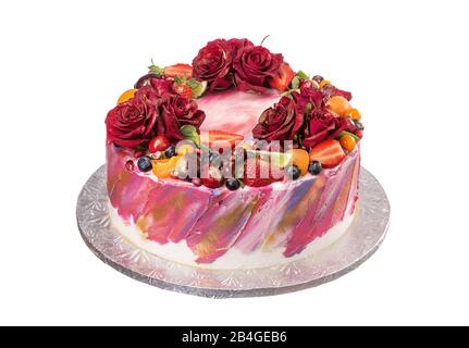 Deliziosa torta decorata con fiori e frutta. Il compleanno Foto Stock