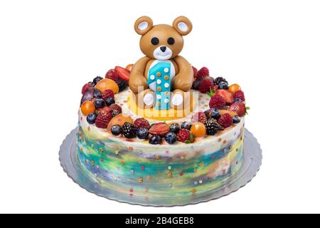 Torta di frutta con un orso il compleanno di un bambino un anno Foto Stock