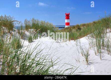 Dune di sabbia con faro su Badedune, Helgoland, baia di Helgoland, baia tedesca, isola del Mare del Nord, Mare del Nord, Schleswig-Holstein, Germania Foto Stock