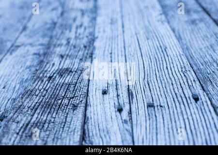 vecchio pavimento in legno con tonalità blu, selezionato fuoco Foto Stock