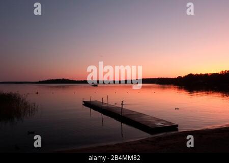 Tramonto sul Lago di Mälaren, vicino a Stoccolma, Svezia Foto Stock