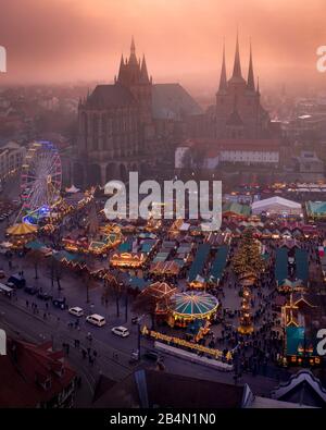 Erfurt mercatino di Natale nebbia al tramonto, Germania Foto Stock