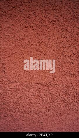 Nero arancio rosso marrone pietra parete grano vernice spray texture sfondo in cemento in stile retrò con spazio copia Foto Stock