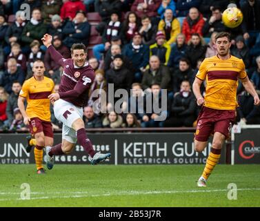 Edimburgo, Scozia, Regno Unito. 07th Mar, 2020. Ladbrokes Scottish Premiership - Cuore Di Midlothian V Motherwell. Tynecastle Park, Edimburgo, Midlothian, Regno Unito. 07th Mar, 2020. PIC shows: Hearts' Right Midfireder, Conor Washington, spara per Goal mentre Hearts ospita Motherwell nella Ladbrokes Scottish Premiership, Tynecastle Park, Edimburgo. Merito: Ian Jacobs/Alamy Live News Foto Stock