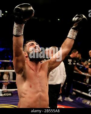 Jono Carroll celebra la vittoria contro Scott Quigg nel suo Super-Featherweight contest alla Manchester Arena. Foto Stock