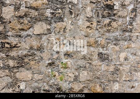 Primo piano di un antico frammento di mura della fortezza, Svizzera - immagine Foto Stock