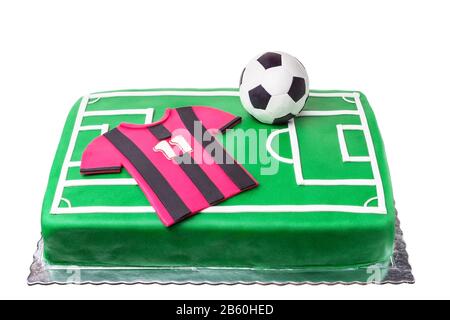 Torta di compleanno per un giocatore di calcio, un campo di calcio e una T-shirt. Foto Stock