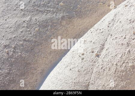 Bianche onde di tufo vulcanico closeup sfondo astratto da Cappadocia, Turchia Foto Stock