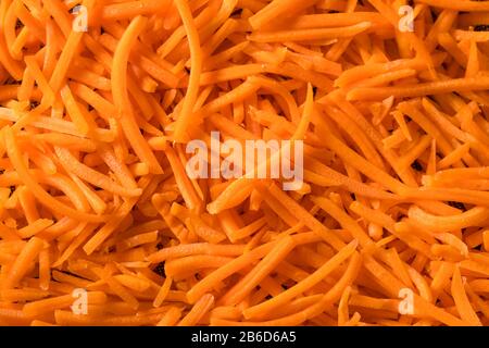 Il Carrot Arancio Organico Grezzo Brilla In Una Ciotola Foto Stock