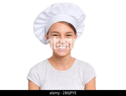 Ragazza teen in cappello chef Foto Stock