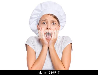 Ragazza teen in cappello chef Foto Stock