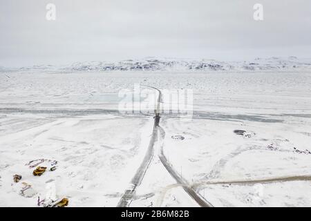 Inverno vicino alla centrale idroelettrica di Sultartangavirkjun, Highlands centrali, Islanda Foto Stock