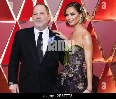 (File) 11th Mar 2020. Harvey Weinstein Condannato a 23 Anni di prigione. Harvey Weinstein trascorrerà 23 anni in una prigione dello Stato di New York dopo essere stato condannato dal giudice della Corte Suprema James Burke la mattina di mercoledì 11 marzo 2020. Nella foto: Hollywood, LOS ANGELES, CALIFORNIA, USA - 26 FEBBRAIO: Harvey Weinstein e moglie/designer di moda Georgina Chapman arrivano al 89th Annual Academy Awards tenutosi presso l'Hollywood and Highland Center il 26 febbraio 2017 a Hollywood, Los Angeles, California, Stati Uniti. (Foto Di Image Press Agency) Credit: Image Press Agency/Alamy Live News Foto Stock