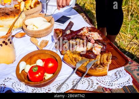 Pasto tradizionale, colazione in aperto al momento del raccolto. Foto Stock