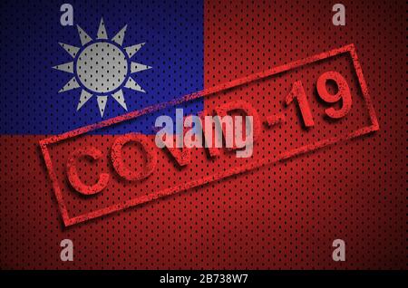 Bandiera di Taiwan e francobollo rosso Covid-19. Concetto di focolaio di coronavirus 2019-nCov Foto Stock