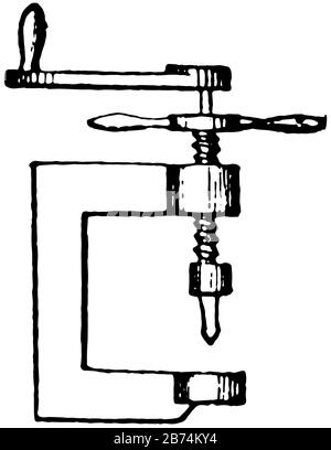 Questa illustrazione rappresenta la perforatrice a morsetto utilizzata per contenere un oggetto con simmetria radiale, disegno a linee vintage o illustrazione di incisione. Illustrazione Vettoriale