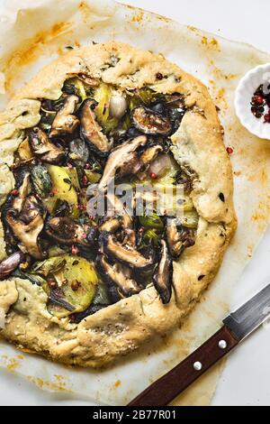 Funghi shitake, patata di porro e Galette di cipolla Foto Stock