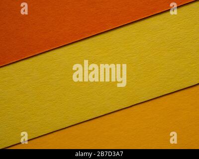 Set di fogli di carta multi-hue. Fogli di carta multicolore impilati l'uno sull'altro, formando uno sfondo in colori pastello. Molto spazio per Foto Stock