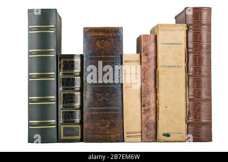 pila di vecchi libri con titoli inseriti da modifiche digitali Foto Stock
