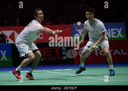 Birmingham. 15 Mar 2020. Hiroyuki Endo (L) e Yuta Watanabe gareggiano durante la partita finale dei doppi uomini con Marcus Fernaldi Gideon e Kevin Sanjaya Sukamuljo in tutto l'Inghilterra Badminton 2020 a Birmingham, in Gran Bretagna, il 15 marzo 2020. Credit: Tim Ireland/Xinhua/Alamy Live News Foto Stock