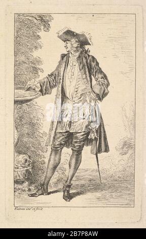 Uomo in piedi con la sua mano destra appoggiata su un bacino, mostrato in vista a tre quarti con la testa rivolta verso sinistra, dalla serie 'Figure della moda' (Figure de Modes), ca. 1710. Foto Stock