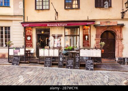 16 settembre 2018: Stoccolma, Svezia - Ristorante Kaffegillet, Gamla Stan, con lavagne esterne sul marciapiede con menu. Foto Stock