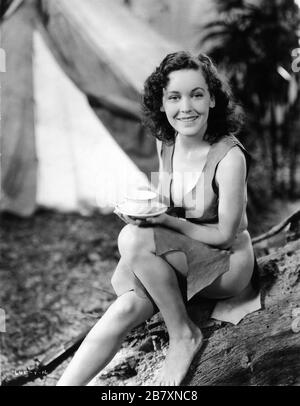 MAUREEN o'SULLIVAN come Jane Parker sul set tazza da bere candid di tè durante la pausa nelle riprese di TARZAN E DEL SUO COMPAGNO 1934 registi CEDRIC GIBBONS e JACK PERSONAGGI CONWAY EDGAR RICE BURROUGHS Foto di TED ALLAN Metro Goldwyn Mayer Foto Stock