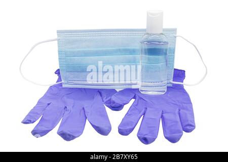 Maschera per naso e bocca con guanti in lattice e gel per mani idroalcolico per prevenire il coronavirus covid-19 Foto Stock