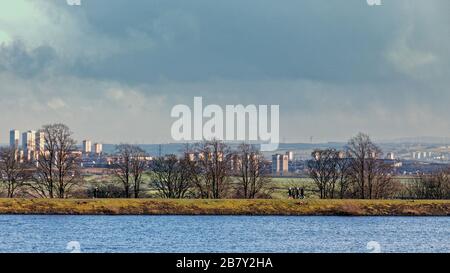 Milngavie, Glasgow, Scozia, Regno Unito, 18 marzo 2020: Regno Unito Meteo:tempeste di neve e sole su Craigmaddie serbatoi la sede della fornitura di acqua per la città di Glasgow. Copywrite Gerard Ferry/ Alamy Live News Foto Stock