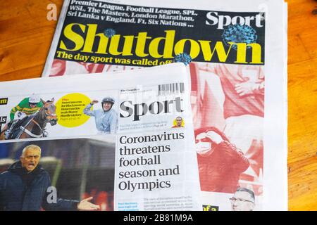 Shutdown Sport Section 'Coronavirus minaccia la stagione del calcio e le Olimpiadi' in Guardian giornali marzo 2020 Londra Inghilterra Regno Unito Foto Stock
