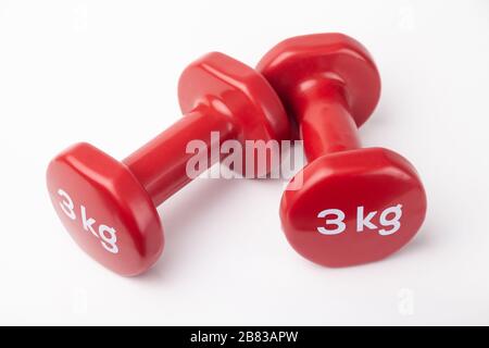Coppia di 3 kg di Dumbbell Foto Stock