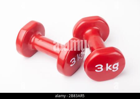Coppia di 3 kg di Dumbbell Foto Stock