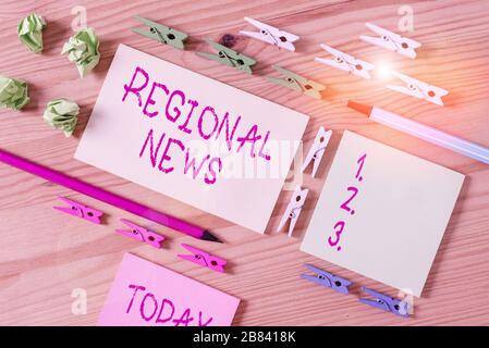 Nota di scrittura che mostra le notizie regionali. Concetto di business per la copertura di eventi, da parte delle notizie, in un contesto locale colorato clothespin carte vuote remin Foto Stock