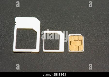 Scheda sim vuota mini, micro, nano per uso internazionale. Foto Stock