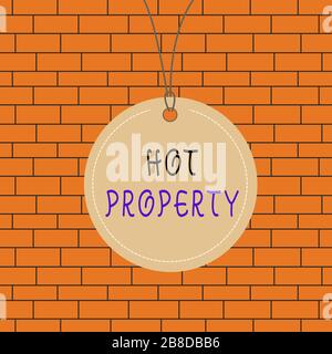 Segno di testo che mostra la proprietà Hot. Testo di foto di affari uno che molti che mostrano vogliono comprare ed è altamente desiderabile Badge cerchio etichetta stringa arrotondato EMP Foto Stock
