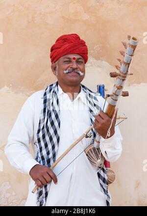 Musicista indiano, Amber Fort, Jaipur, Rajasthan, India Foto Stock