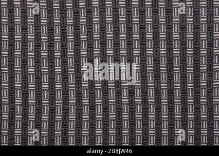 La tessitura di una lana di maglia marrone. Sfondo. Foto ad alta risoluzione. Profondità di campo completa. Foto Stock
