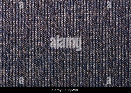 La tessitura di una lana di maglia marrone. Sfondo. Foto ad alta risoluzione. Profondità di campo completa. Foto Stock