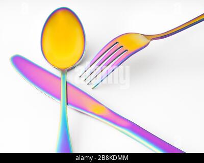 Posate colorate con cucchiaio a forchetta Foto Stock
