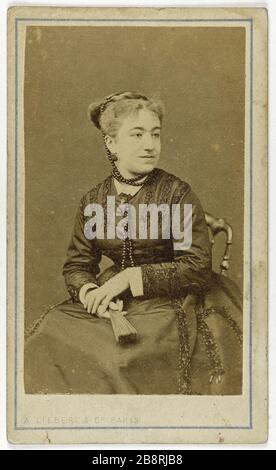 Ritratto di Laure Dordet (-1900), chiamato Milla, attrice teatrale. Portrait de Laure Dordet (décédée en 1900), dite Milla, attrice de théâtre. Carte de visite (recto). Tirage sur papier albuminé. 1860-1890. Photographie d'A. Liébert & Cie. Parigi, musée Carnavalet. Foto Stock