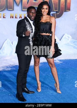 (FILE) Kevin Hart e la moglie Eniko Parrish Hart si aspettano il loro secondo bambino insieme. Il comico e sua moglie, Eniko Parrish Hart, si aspettano il loro secondo bambino insieme e di recente hanno condiviso le buone notizie via Instagram il martedì 24 marzo 2020. HOLLYWOOD, LOS ANGELES, CALIFORNIA, USA - DICEMBRE 09: L'attore Kevin Hart e la moglie Eniko Parrish arrivano alla prima mondiale della Columbia Pictures 'Jumanji: The Next Level' che si tiene al TCL Chinese Theatre IMAX il 9 Dicembre 2019 a Hollywood, Los Angeles, California, Stati Uniti. (Foto di Xavier Collin/Image Press Agency) Foto Stock