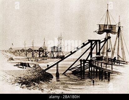 Una vecchia incisione che mostra Port Clarence Docks, Middlesbrough UK. Il piccolo villaggio ora all'interno del distretto di Stockton-on-Tees e della contea di Durham, Inghilterra si trova sulla riva nord del fiume Tees, e ospita l'estremità settentrionale del Middlesbrough Transporter Bridge. Era precedentemente conosciuto come battini di samphire Foto Stock