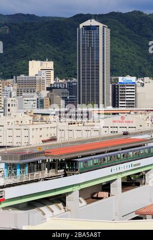 Rivestimento porta la stazione della monorotaia, la città di Kobe, isola di Honshu, Giappone, Asia Foto Stock