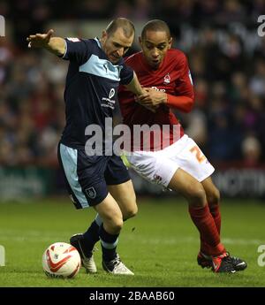 Dexter Blackstock di Nottingham Forest e Dean Marney di Burnley Foto Stock